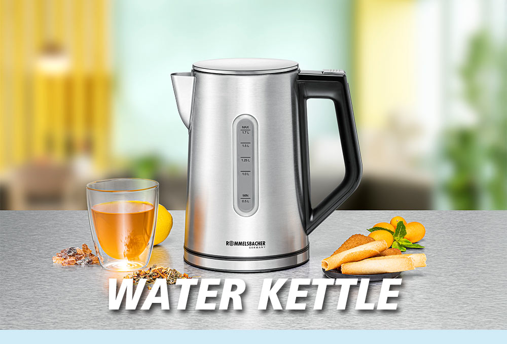 A silver electric water kettle with a glass of tea next to it, along with a dessert of oranges and herbs. The text in the image reads: “WATER KETTLE”.