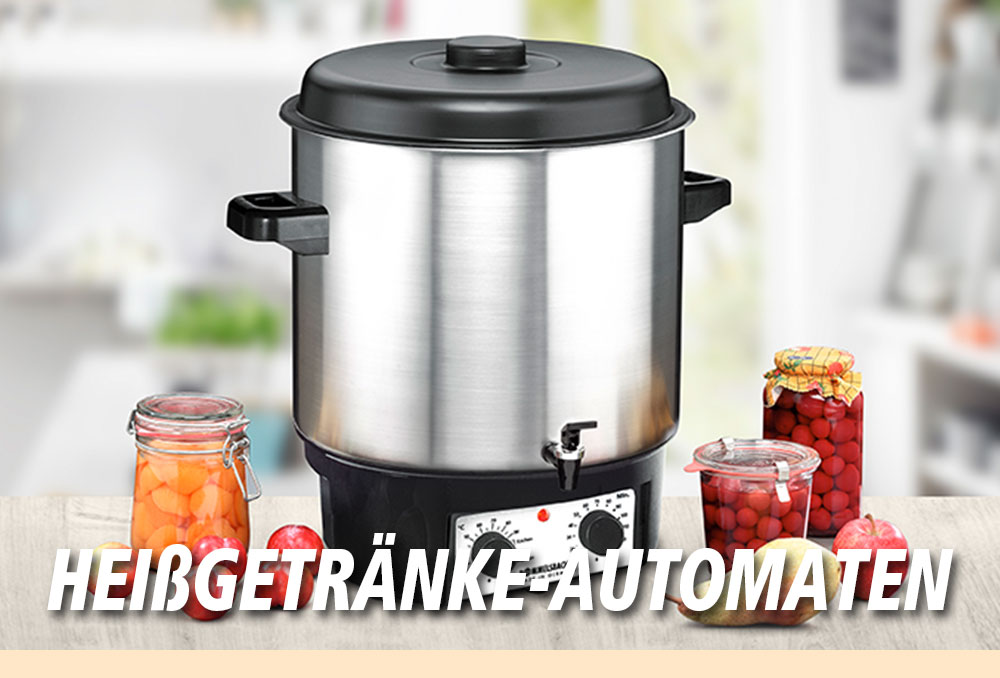 Ein großer silberner Heißgetränkeautomat mit Zapfhahn, umgeben von Einmachgläsern mit Fruchtkompott. Im Bild steht in weißer Schrift: „HEISSGETRÄNKE-AUTOMATEN“.