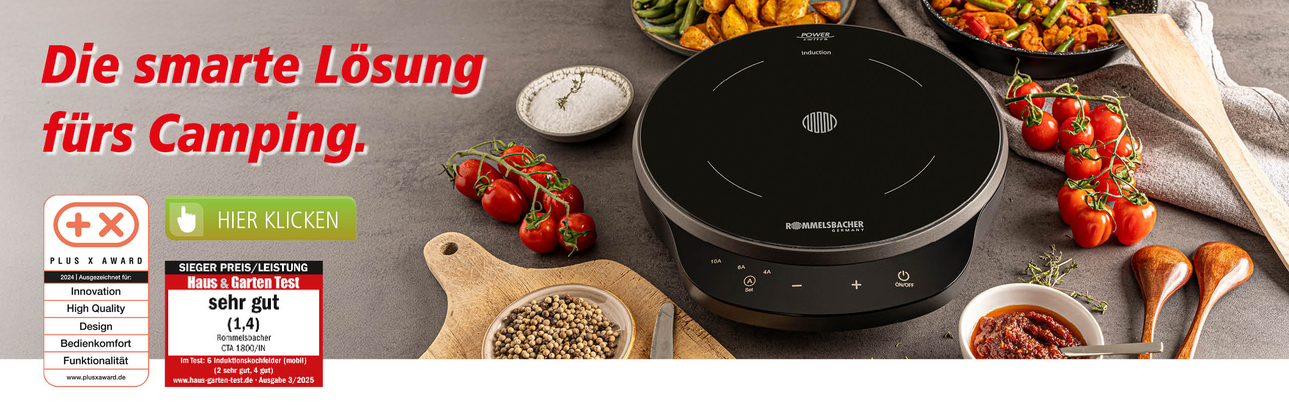 Induktionskochplatte Rommelsbacher CTA 1800/IN auf einer Arbeitsfläche, umgeben von frischen Zutaten und Gewürzen. Slogan: „Die smarte Lösung fürs Camping“. Testsiegel wie „Haus & Garten Test – sehr gut (1,4)“ sichtbar.