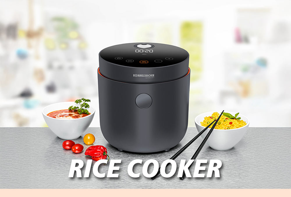A black rice cooker with a touch control panel on top. Next to it a bowl of cooked rice, chopsticks, cherry tomatoes, and another bowl with vegetables. The text in the image reads: “RICE COOKER”.