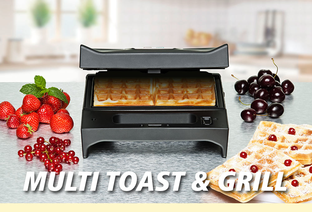 A black multi toaster with open lid, containing four golden brown toast slices. Next to it are waffles with cherries, grapes, strawberries, and red currants. The text in the image reads: “MULTI TOAST & GRILL”.