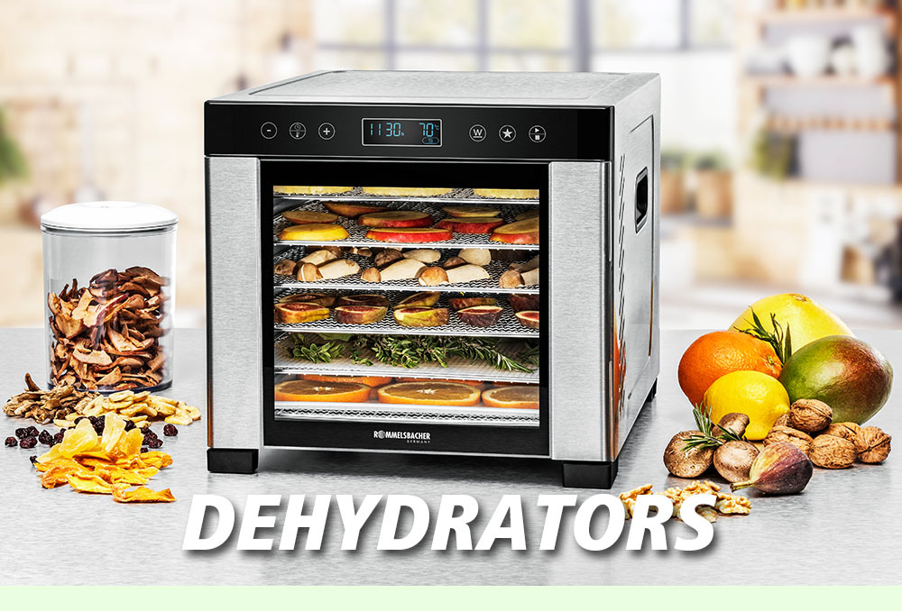 A silver dehydrator with multiple trays filled with dried fruit, vegetables, and herbs. Next to it is a selection of fresh fruit and nuts. The text in the image reads: “DEHYDRATORS”.